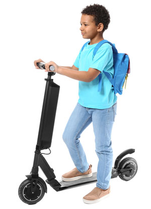 boy in a e-scooter