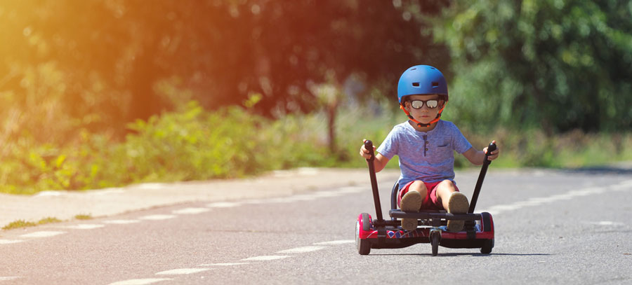 boy riding a hoverkart