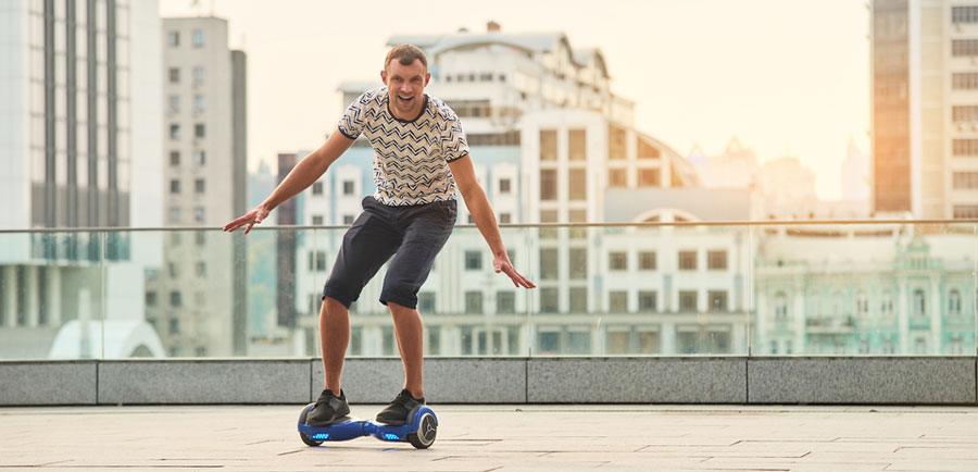 Adult riding a hoverboard